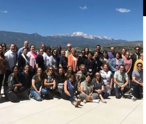 Knapsack Institute participants with Pikes Peak in the background 